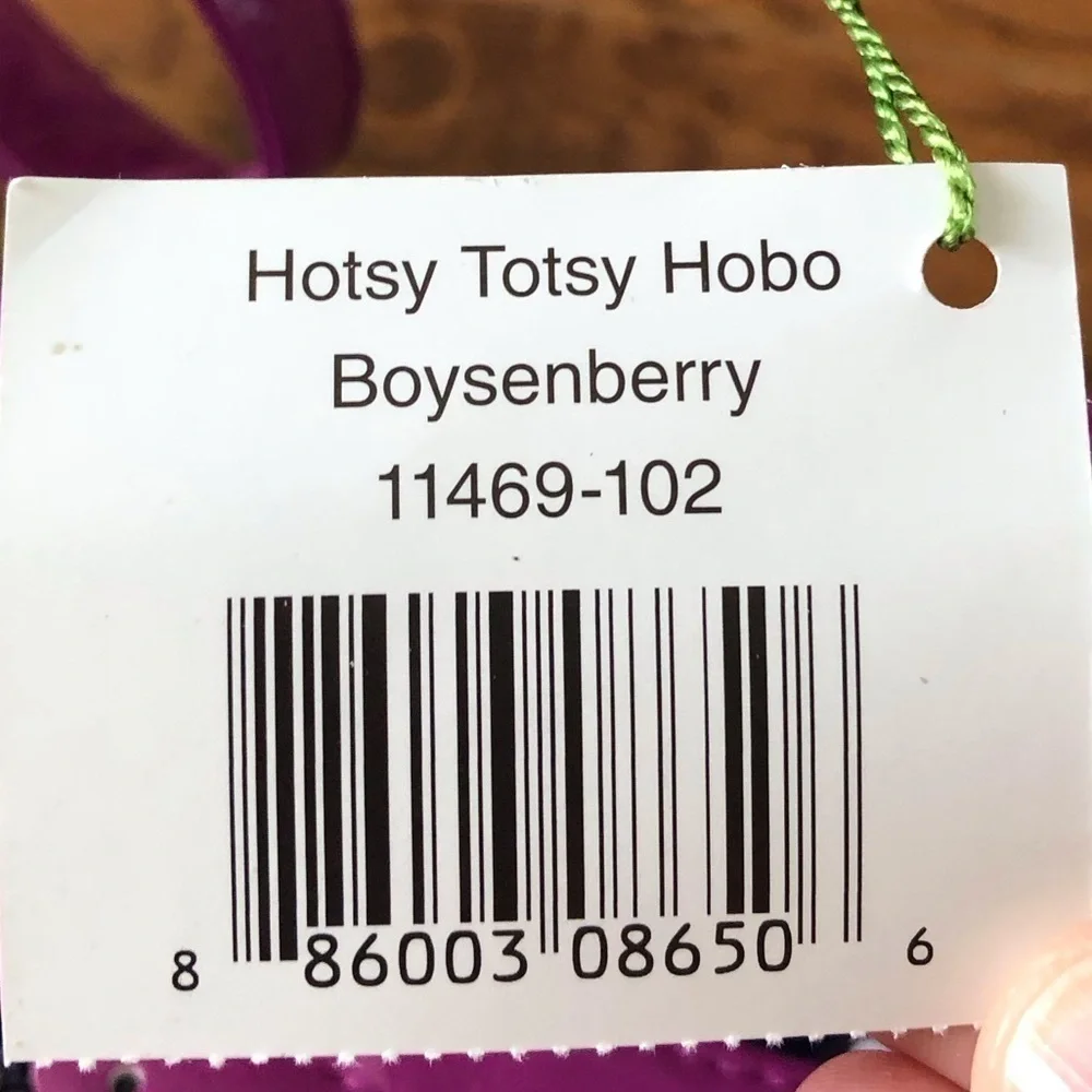 Vera Bradley Hotsy Totsy Hobo in boysenberry print (tiny Flaw)